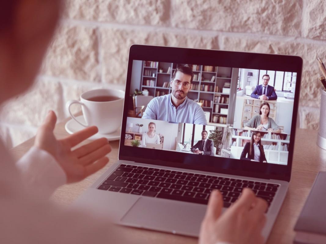 Group of diverse students practicing yoga together in a bright university studio space